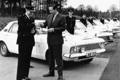 Tony Rolt presenting keys of 4WD Ford Zephyr police cars
